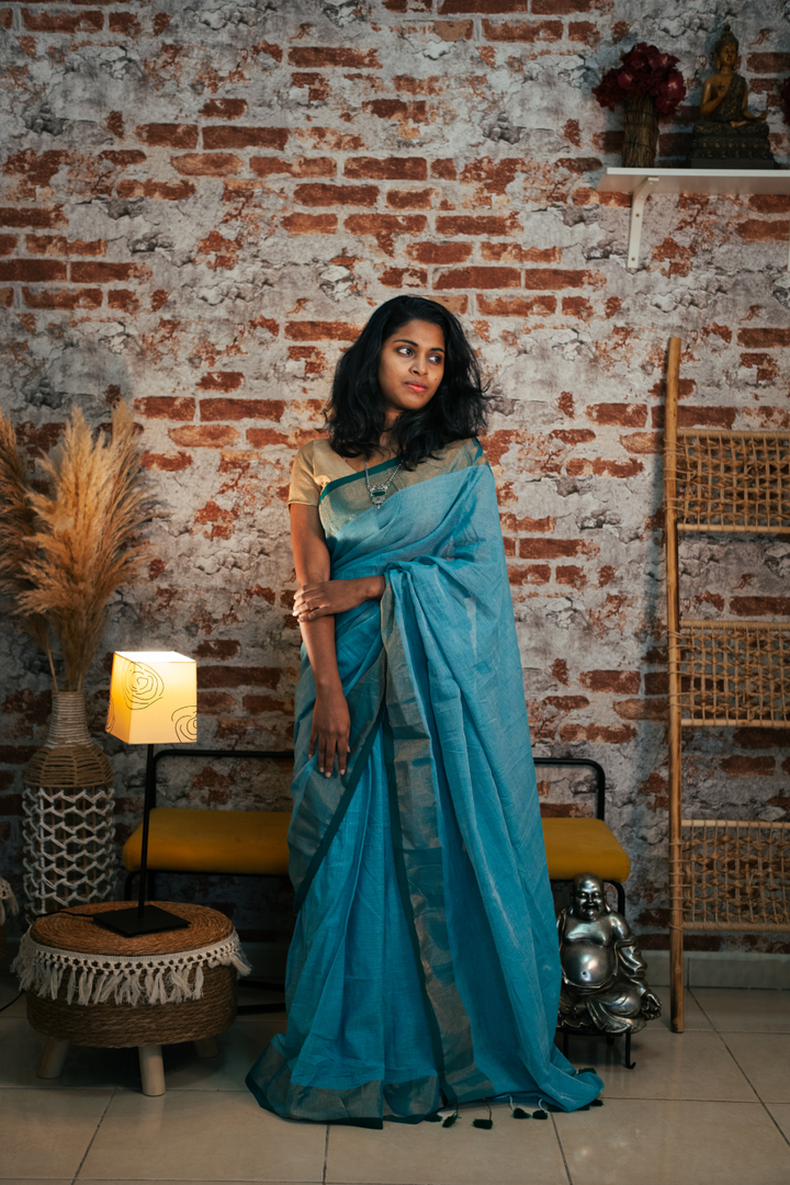 Elegant green handloom cotton  saree with tessel